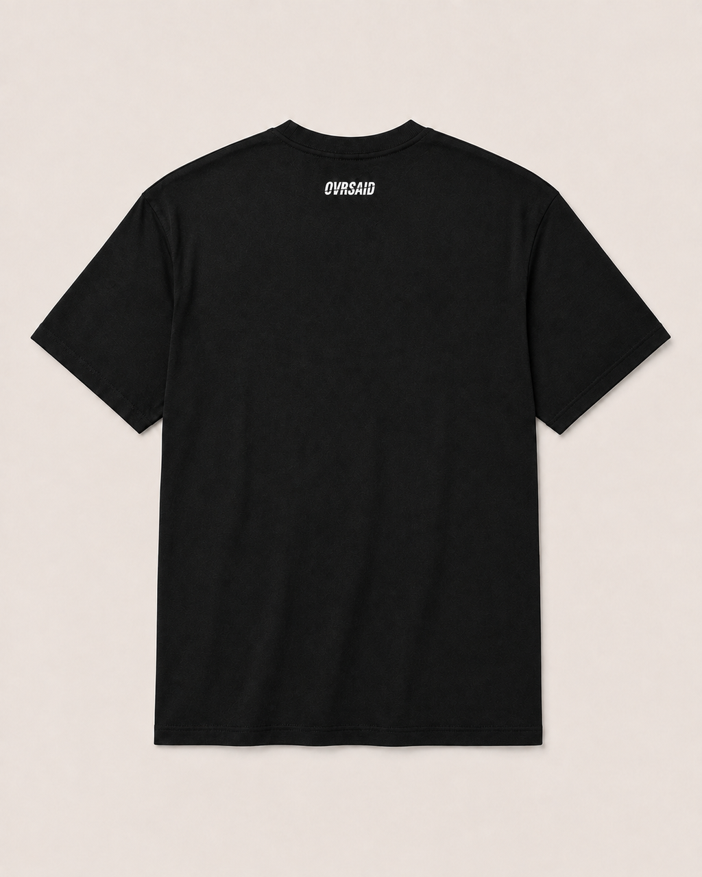 OVRSAID black statement tee, back view with small OVRSAID neck logo