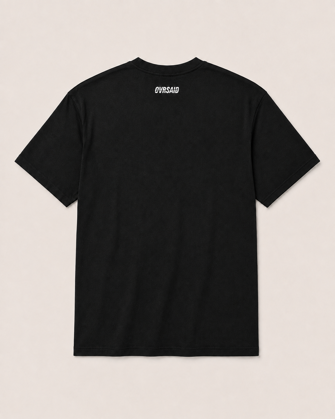 OVRSAID black statement tee, back view with small OVRSAID neck logo