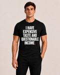 OVRSAID I HAVE EXPENSIVE TASTE AND QUESTIONABLE INCOME black statement tee worn by male model, front print