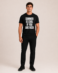OVRSAID SUMMER IS COOL IF YOU ARE RICH black statement tee worn by male model, front print