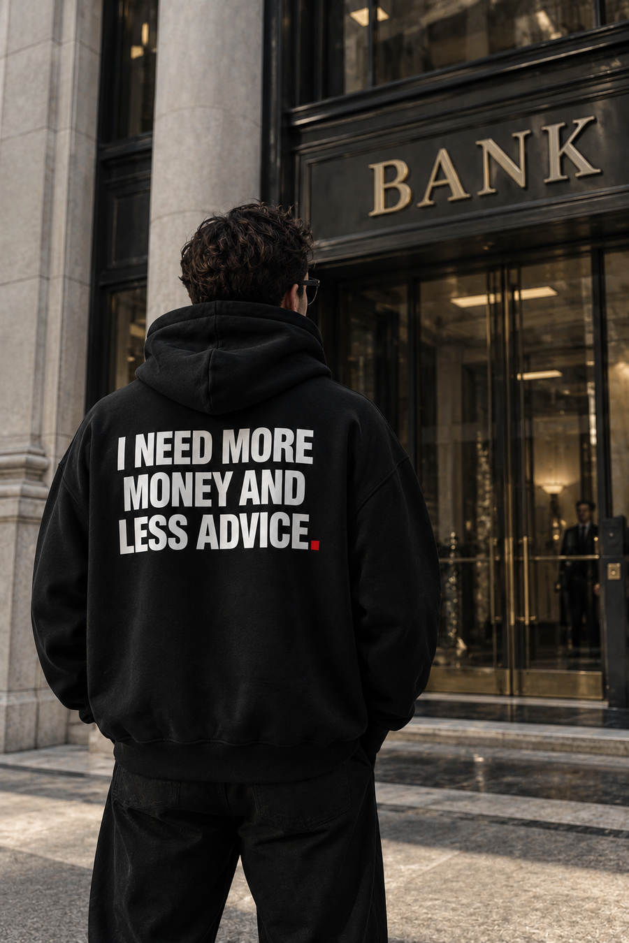 Color Black — OVRSAID I NEED MORE MONEY AND LESS ADVICE. oversized hoodie on male model, back view showing the white back print