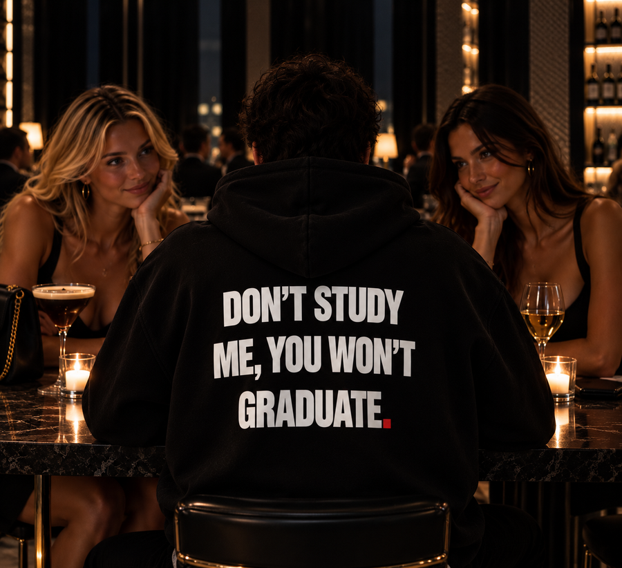 Color Black — OVRSAID DON'T STUDY ME. YOU WON'T GRADUATE. oversized hoodie on male model, back view showing the white back print