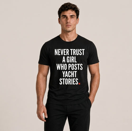 OVRSAID NEVER TRUST A GIRL WHO POSTS YACHT STORIES black statement tee worn by male model, front print