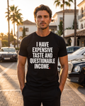 Color Black — OVRSAID I HAVE EXPENSIVE TASTE AND QUESTIONABLE INCOME tee on male model, front view